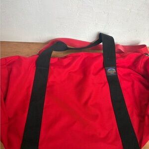 Vibrant Red Duffel Bag with Black Straps vintage CAMPINN made it in the USA
